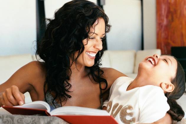Mother and child reading a book
