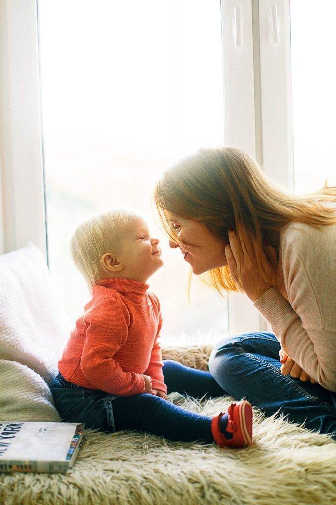 Mom and child practicing floortime