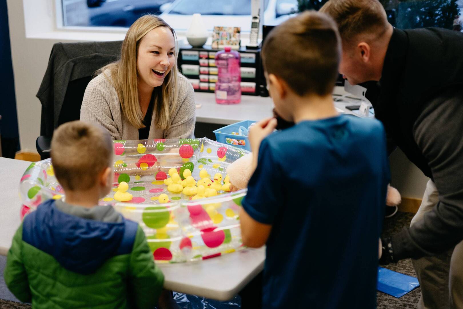 speech therapist assising children in speech practices