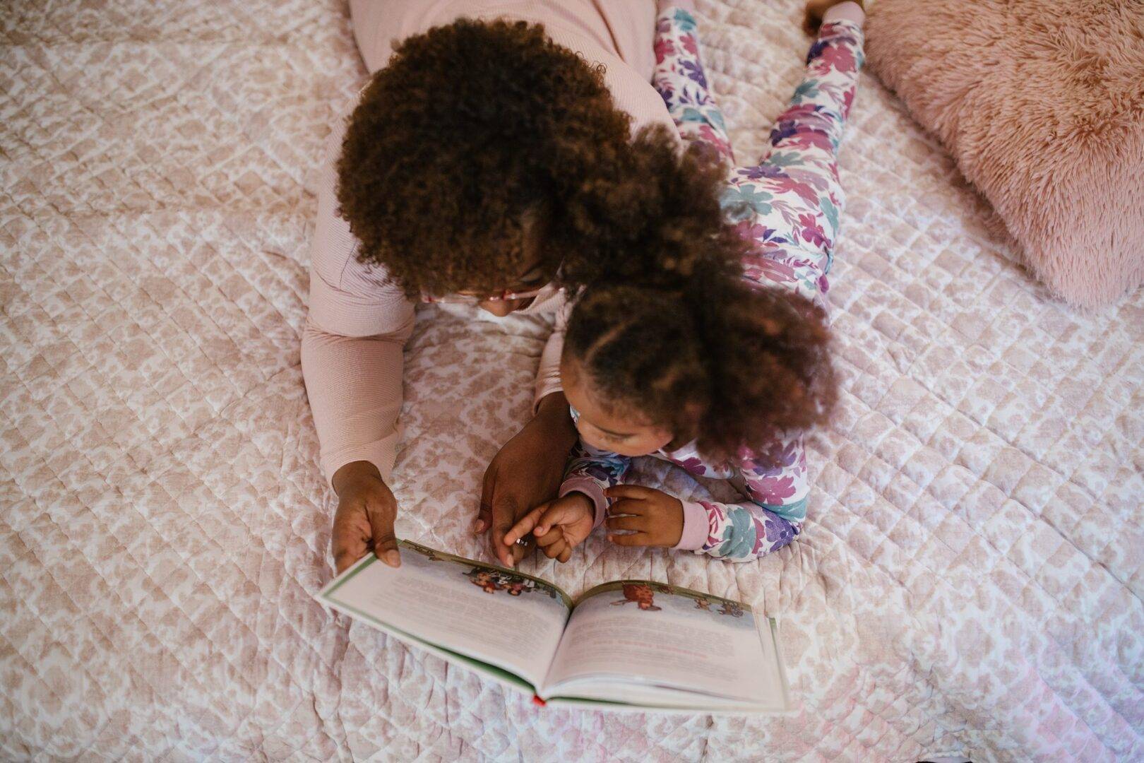 Adult and child reading