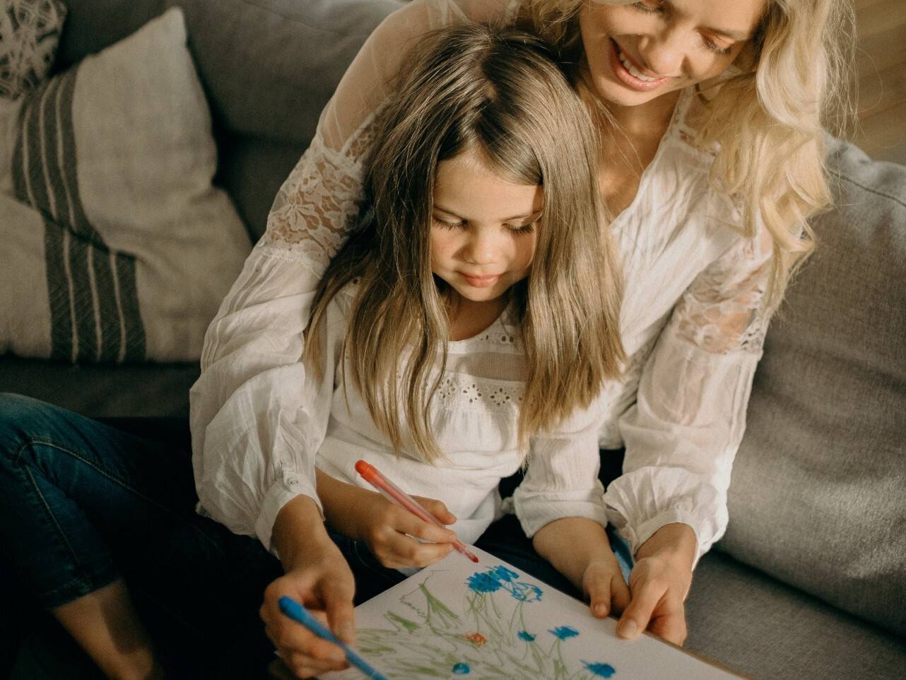 Build Language Around the Holidays 2 Adult and child drawing a Christmas tree