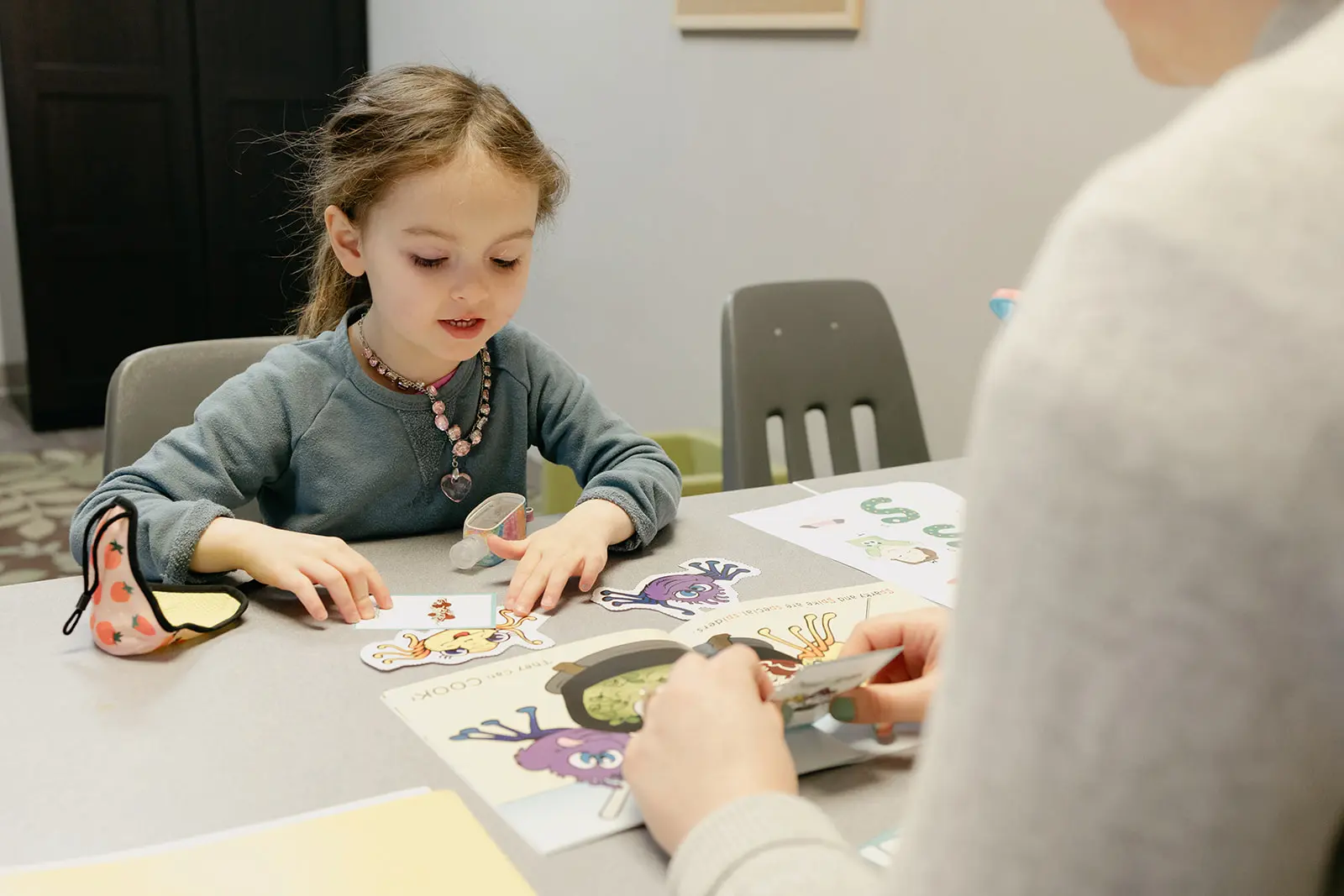 child at speech pathologist session